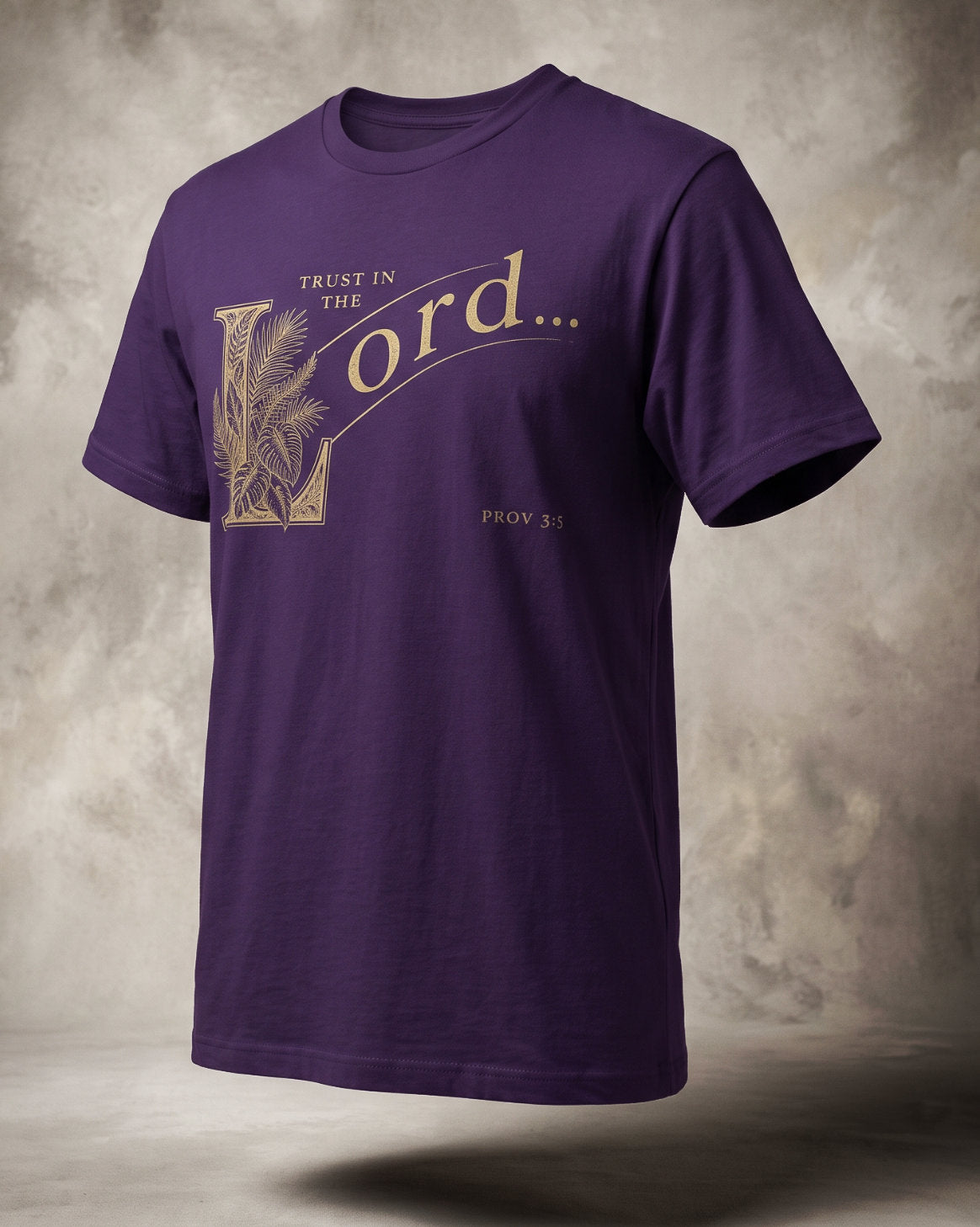 Trust in the Lord t-shirt in purple with gold ornamental lettering and Prov 3:5, three-quarter studio view